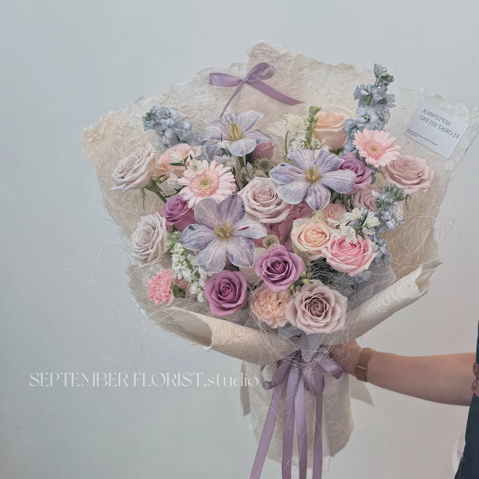 Violet Hour — Grand — Roses, lisianthus, statice in violet and cream, view 2